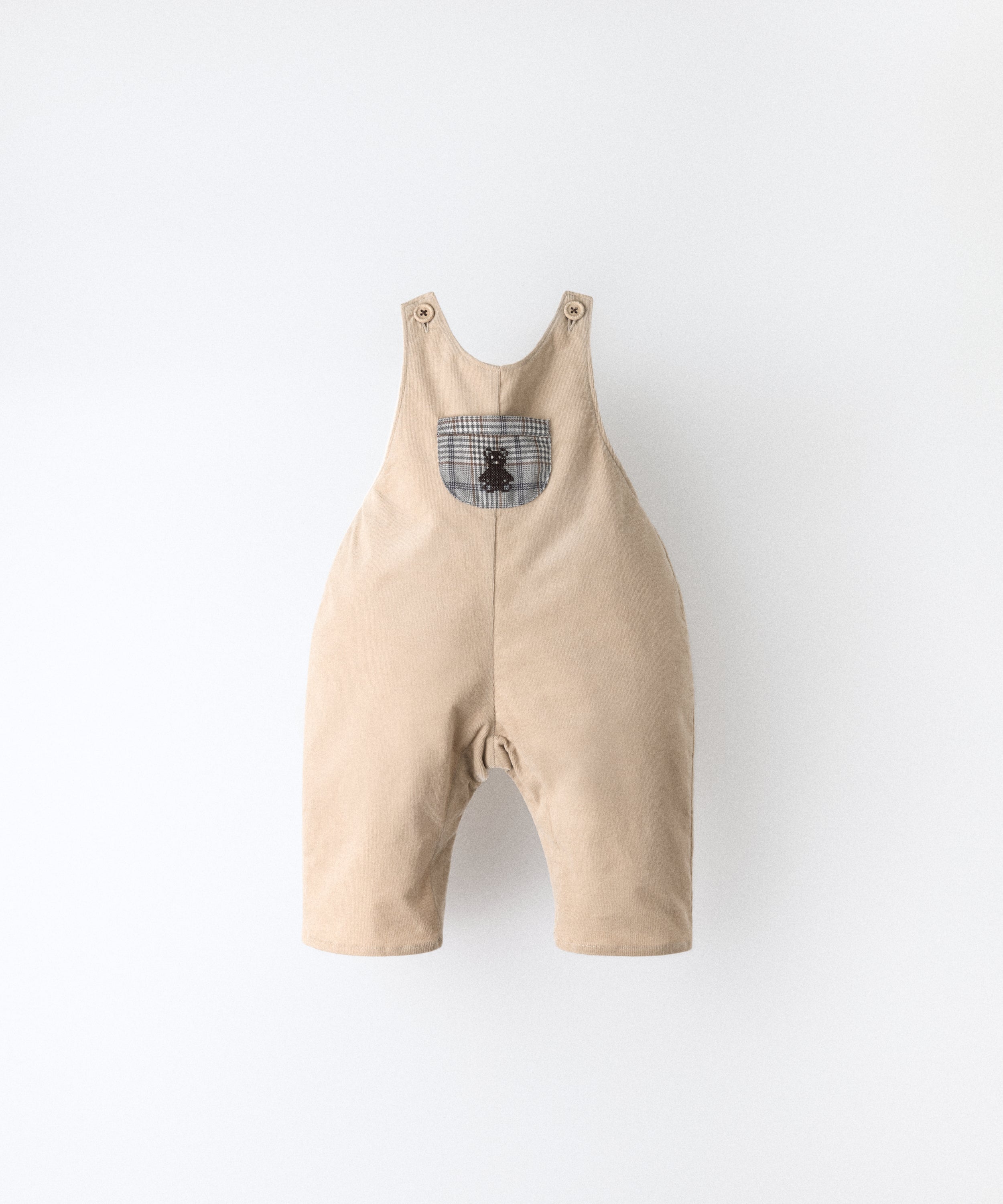 Peto bebé beige en pana elástica BCI con tirantes ajustables y diseño efecto globo Kala.