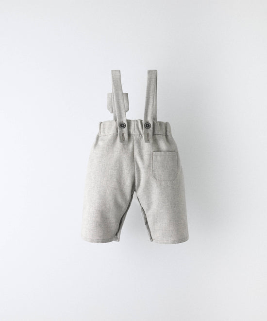 Parte trasera del pantalón de bebé con tirantes en gris con bolsillo — Kala