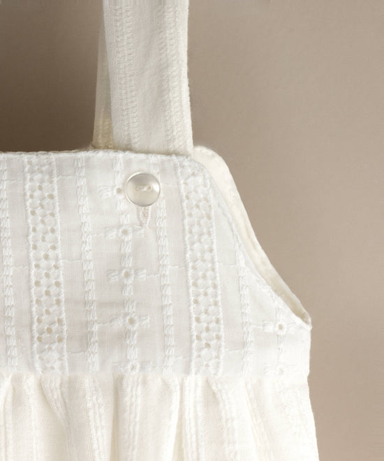 Ranita de bebé marfil de algodón con tejido y canesú bordados